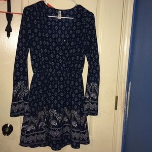 Long sleeve V-Shaped dress.